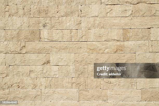 limestone wall - natural stone block stockfoto's en -beelden