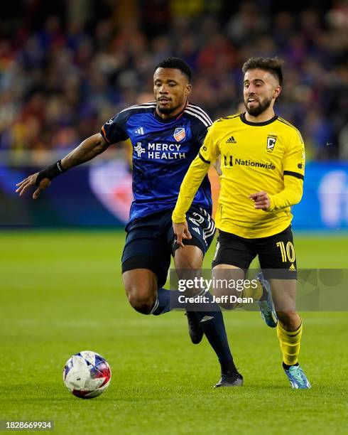 Diego Rossi of Columbus Crew battles against Alvas Powell of FC Cincinnati during the 2023 MLS Cup Playoffs Eastern Conference Final match at TQL...