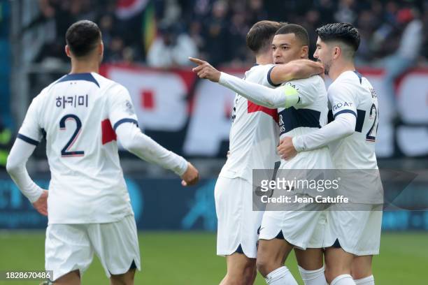Kylian Mbappe of PSG celebrates his goal with teammates during the Ligue 1 Uber Eats match between Le Havre AC and Paris Saint-Germain at Stade...