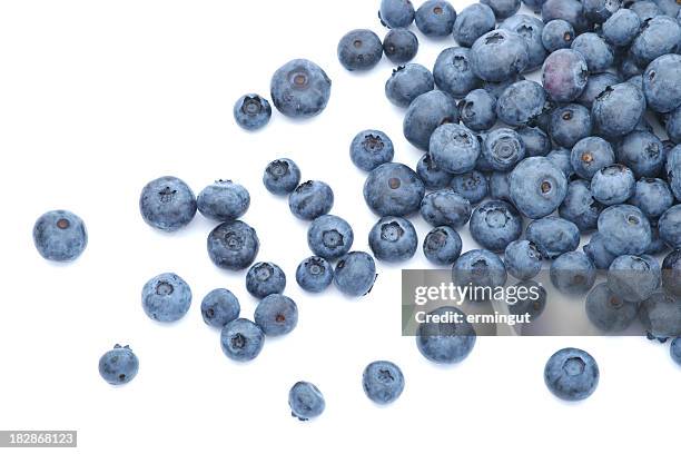 blueberries scattered on white background - bluebearry stock pictures, royalty-free photos & images