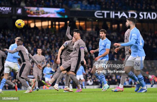 Son Heung-Min of Tottenham Hotspur scores an own goal, Manchester City's first goal during the Premier League match between Manchester City and...