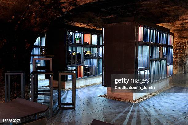 very modern wine cellar with illuminated shelves, security bars - wine room stock pictures, royalty-free photos & images