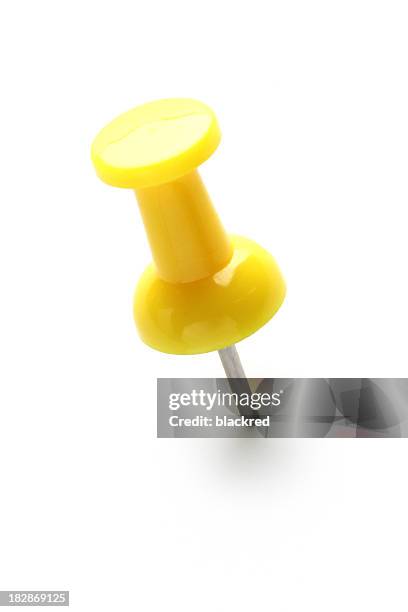 yellow push pin - punaise stockfoto's en -beelden