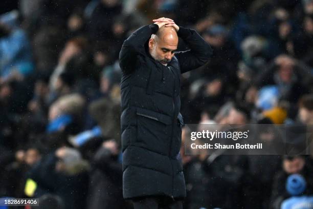 Pep Guardiola, Manager of Manchester City, reacts during the Premier League match between Manchester City and Tottenham Hotspur at Etihad Stadium on...