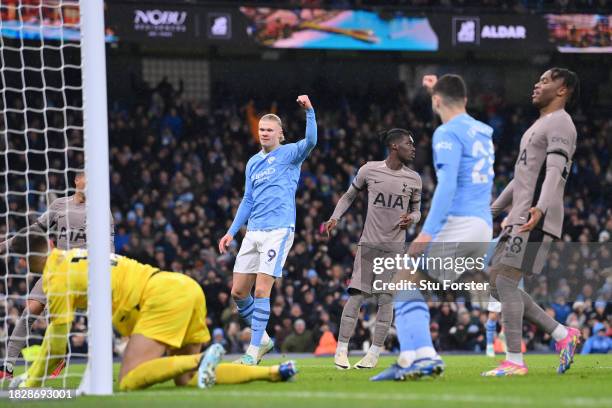 Erling Haaland of Manchester City celebrates after Son Heung-Min of Tottenham Hotspur scores an own goal during the Premier League match between...