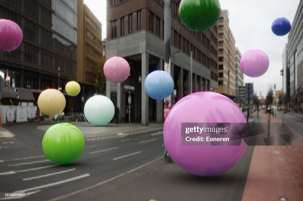 Multi colored balloons flying in the city