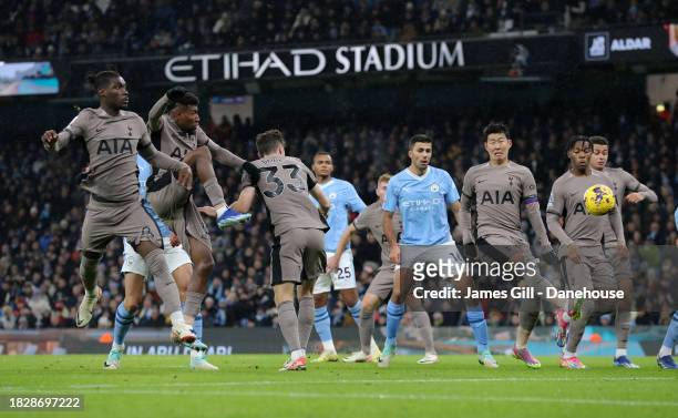 Son Heung-min of Tottenham Hotspur scores an own goal during the Premier League match between Manchester City and Tottenham Hotspur at Etihad Stadium...