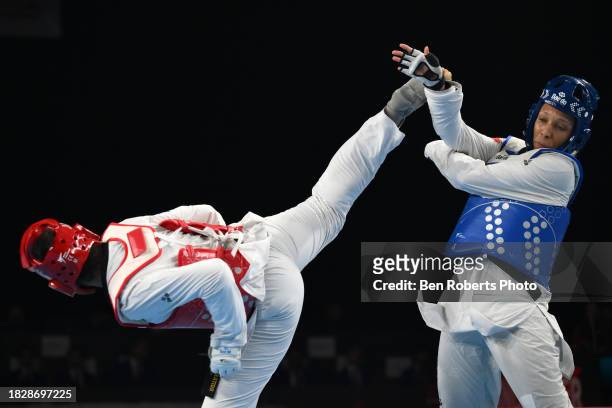 Althea Laurin of France competes in the final against Solene Avoulette of France in the Female +67kg category at Manchester Regional Arena on...