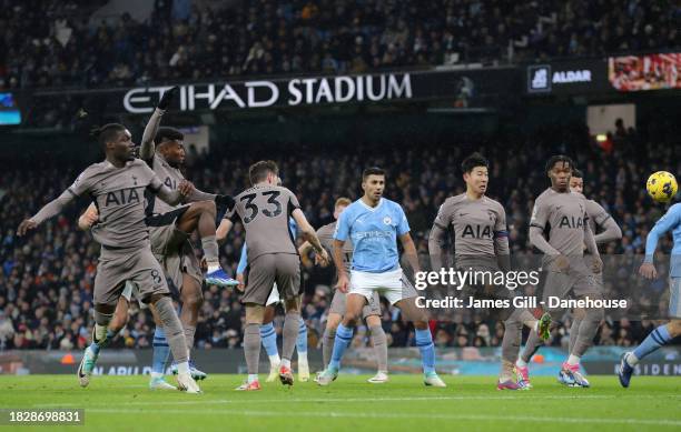 Son Heung-min of Tottenham Hotspur scores an own goal during the Premier League match between Manchester City and Tottenham Hotspur at Etihad Stadium...