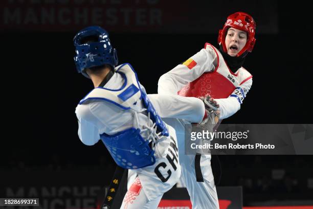 Sarah Chaari of Belgium competes in the finalagainst Mengyu Zhang of China in the Female -67kg category at Manchester Regional Arena on December 03,...