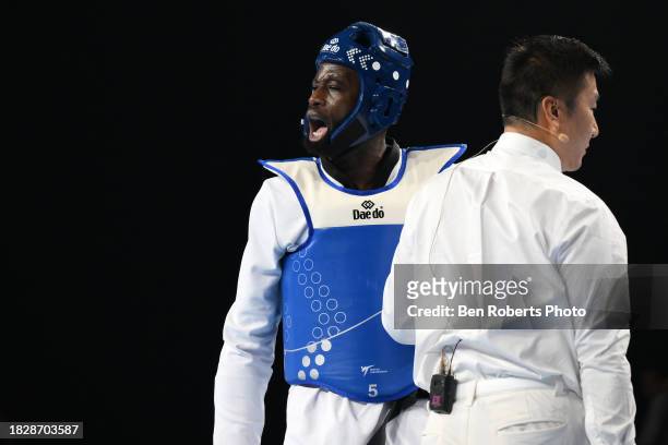Cheick sallah Cisse of Ivory Coast competes in the final against Maicon Siqueira of Brazil in the Male +80kg category at Manchester Regional Arena on...