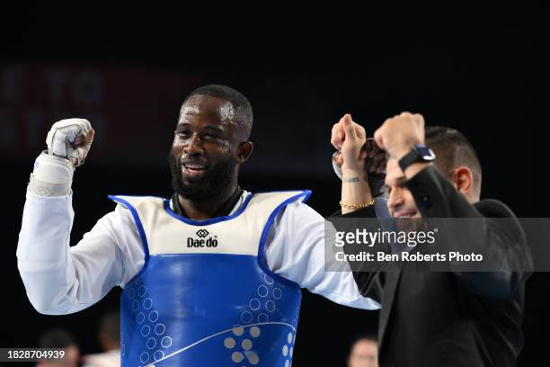 Cheick sallah Cisse of Ivory Coast celebrates his win in the final against Maicon Siqueira of Brazil in the Male +80kg category at Manchester...