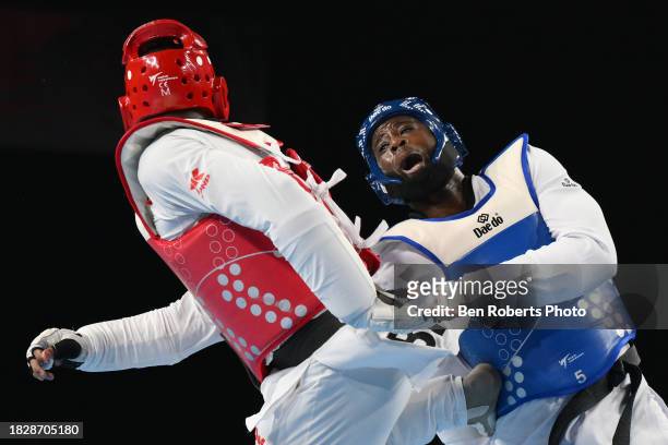 Cheick sallah Cisse of Ivory Coast competes in the final against Maicon Siqueira of Brazil in the Male +80kg category at Manchester Regional Arena on...