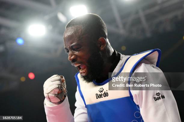 Cheick sallah Cisse of Ivory Coast celebrates his win in the final against Maicon Siqueira of Brazil in the Male +80kg category at Manchester...