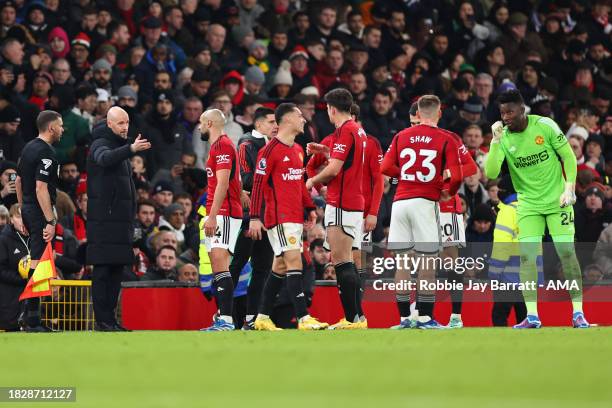 Erik ten Hag the head coach / manager of Manchester United instructs his players during the Premier League match between Manchester United and...