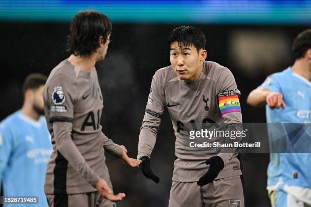 Son Heung-Min of Tottenham Hotspur reacts towards teammate Bryan Gil during the Premier League match between Manchester City and Tottenham Hotspur at...