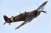 A close-up of a Supermarine Spitfire aircraft in flight