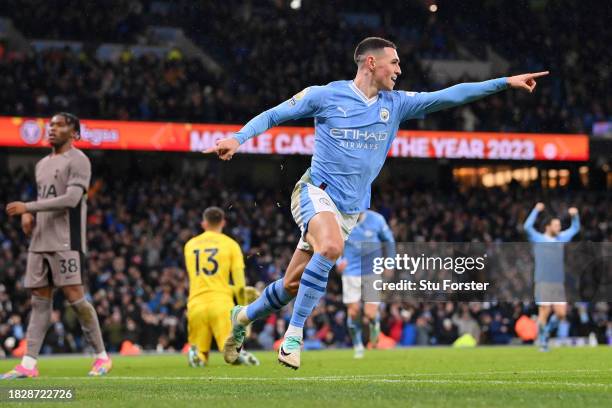 Phil Foden of Manchester City celebrates after scoring the team's second goal during the Premier League match between Manchester City and Tottenham...