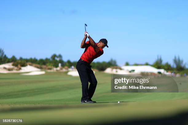 Tiger Woods of the United States plays a shot on the third hole during the final round of the Hero World Challenge at Albany Golf Course on December...