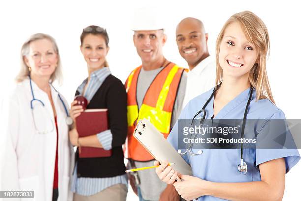 happy young nurse and people from different walks of life - group health workers white background stock pictures, royalty-free photos & images
