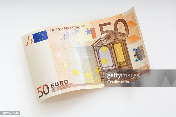 waved fifty euro note - paper currency stockfoto's en -beelden