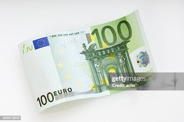 waved 100 euro note - banknotes stock pictures, royalty-free photos & images