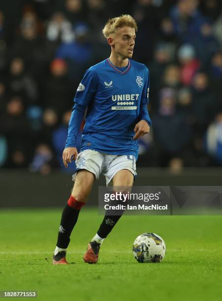 Ross McCausland of Rangers controls the ball during the Cinch Scottish Premiership match between Rangers FC and St. Mirren FC at Ibrox Stadium on...