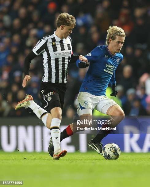 Todd Cantwell of Rangers vies with Mark O'Hara of St Mirren during the Cinch Scottish Premiership match between Rangers FC and St. Mirren FC at Ibrox...