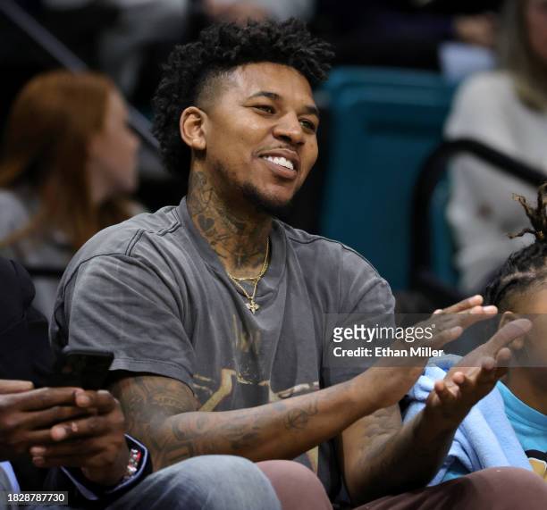 Former USC Trojans basketball player Nick "Swaggy P" Young attends a game between the Trojans and the Gonzaga Bulldogs during the Legends of...