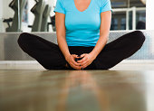 Young Woman Doing a Groin Stretching Exercise