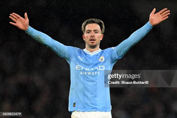 Jack Grealish of Manchester City celebrates after scoring the team's third goal during the Premier League match between Manchester City and Tottenham...