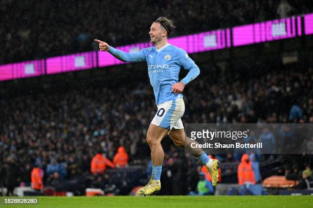 Jack Grealish of Manchester City celebrates after scoring the team's third goal during the Premier League match between Manchester City and Tottenham...
