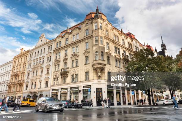 people walk the old historic streets of old town in prague czech republic czechia - stare mesto stock pictures, royalty-free photos & images