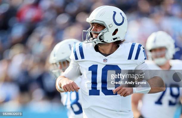 Gardner Minshew of the Indianapolis Colts celebrates after throwing for a touchdown against the Tennessee Titans during the first quarter of the game...