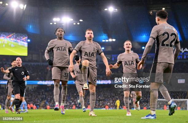 Dejan Kulusevski of Tottenham Hotspur celebrates after scoring the team's third goal during the Premier League match between Manchester City and...