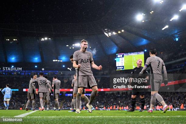 Dejan Kulusevski of Tottenham Hotspur celebrates after scoring the team's third goal during the Premier League match between Manchester City and...