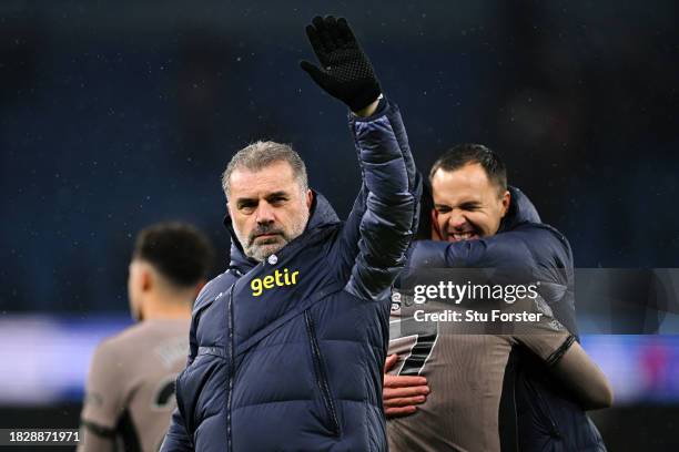 Ange Postecoglou, Manager of Tottenham Hotspur, acknowledges the fans following the Premier League match between Manchester City and Tottenham...