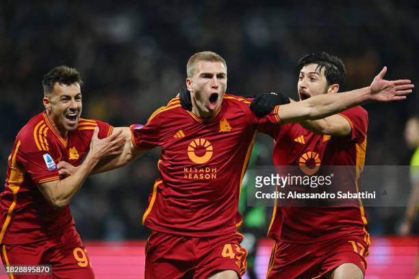 Rasmus Kristensen of AS Roma celebrates with teammates Stephan El Shaarawy and Sardar Azmoun after scoring the team's second goal during the Serie A...