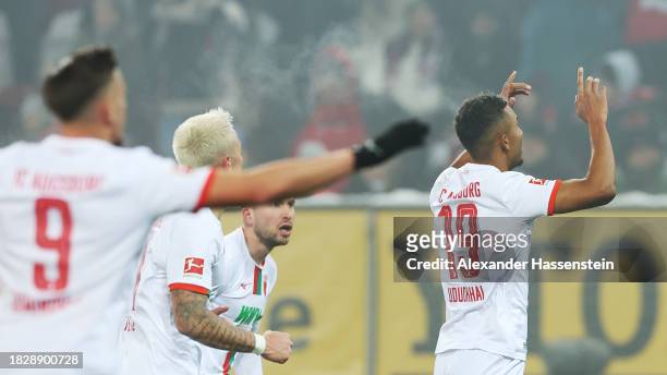 Felix Uduokhai of FC Augsburg celebrates after scoring the team's first goal before it is disallowed during the Bundesliga match between FC Augsburg...