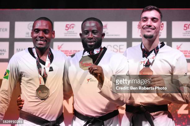 Silver medalist Maicon Siqueira of Brazil, gold medalist Cheick Sallah Cisse of Ivory Coast and bronze medalist Ivan Garcia Martinez of Spain during...