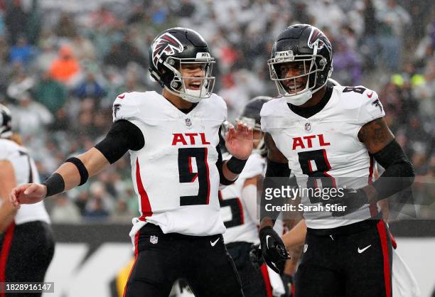 Desmond Ridder of the Atlanta Falcons reacts after a touchdown during the second quarter in the game against the New York Jets at MetLife Stadium on...