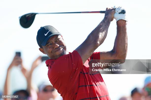 Tiger Woods of the United States plays his shot from the 15th tee during the final round of the Hero World Challenge at Albany Golf Course on...