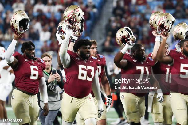 Jeremiah Byers of the Florida State Seminoles walks the field with the team before taking on the Louisville Cardinals during the ACC Championship at...