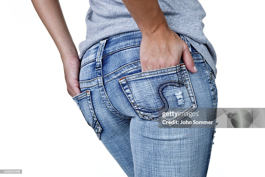 Female buttocks wearing jeans