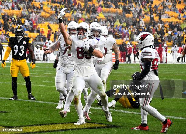 Trey McBride of the Arizona Cardinals celebrates after a touchdown in the game against the Pittsburgh Steelers during the second quarter at Acrisure...