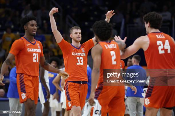 Bas Leyte of the Clemson Tigers celebrates with teammates in the first half while playing the Pittsburgh Panthers at Petersen Events Center on...