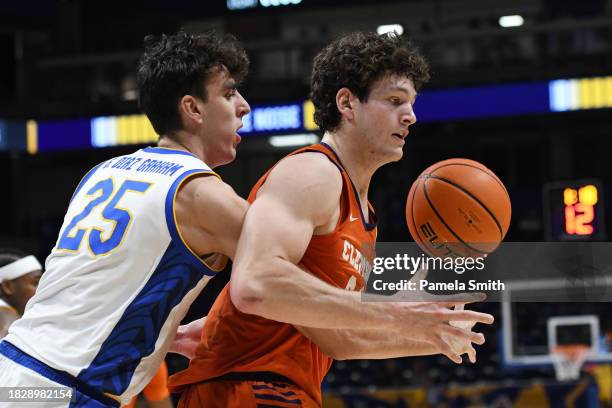 Guillermo Diaz Graham of the Pittsburgh Panthers fights for the ball with PJ Hall of the Clemson Tigers during the first half of the game at Petersen...