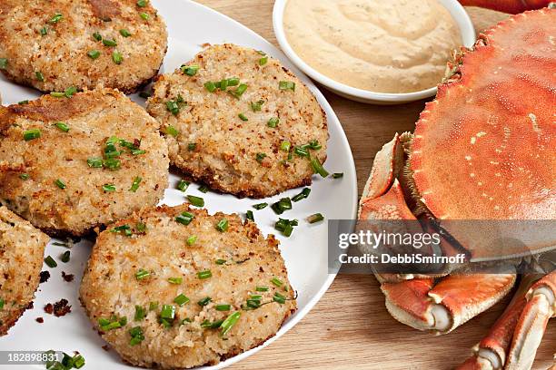 homemade crab cakes with remoulade - dungeness stock pictures, royalty-free photos & images