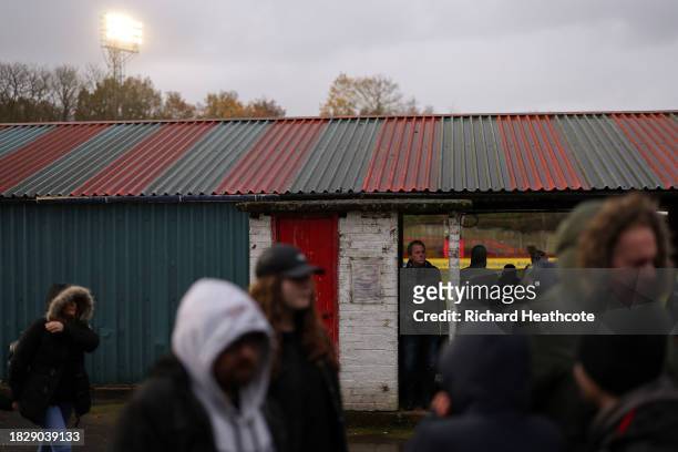 Fans make their way around the ground during the Emirates FA Cup Second Round match between Aldershot Town and Stockport County at The Electrical...