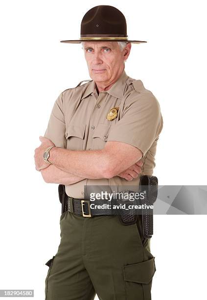 mature highway patrolman portrait - police hat stock pictures, royalty-free photos & images